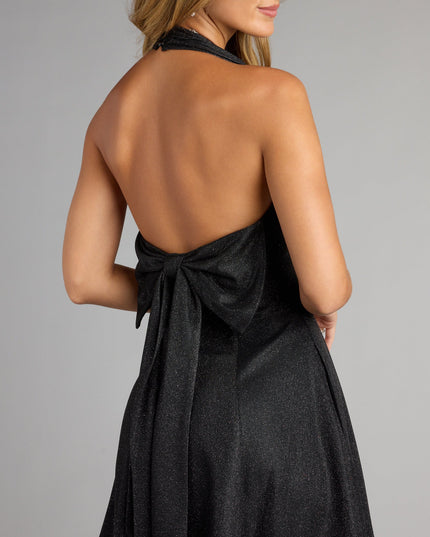 Feel ready for every dance floor moment or feed-worthy reel in the Anika Glitter Bow Skater Mini Dress, a homecoming dress designed to own your moment.