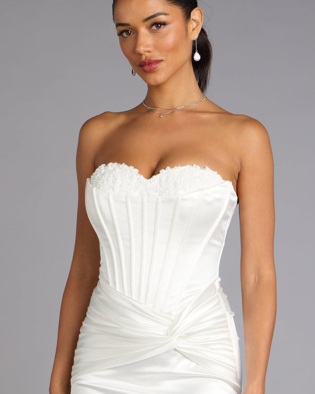 This prom dress, the Alexia Satin Lace Bustier Mini Dress , features a sleek, floor-length design with trend-forward details that capture the excitement of Prom 2026.