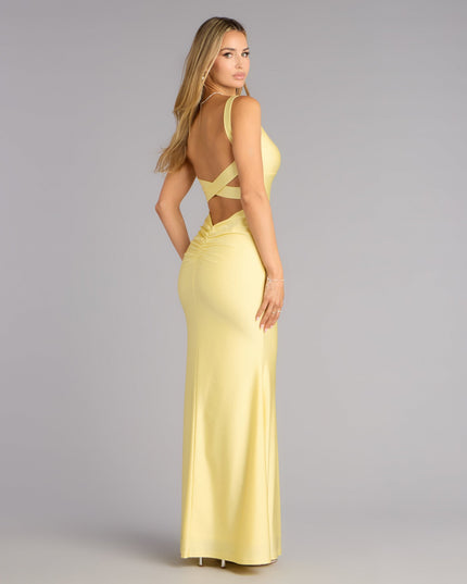 The Trish Open Back Mermaid Formal Dress is a yellow prom dress that blends trend-forward design with a flattering fit, perfect for celebrating your night with confidence.
