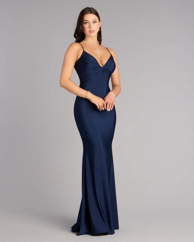 From the fitted bodice to the dramatic flare, you’ll feel confident and camera-ready in the Scarlet Strappy Back Mermaid Formal Dress—a navy blue prom dress made for unforgettable pics.
