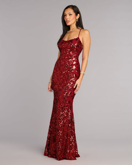 This red prom dress, the Betty Sequin Strappy Mermaid Formal Dress , features a sleek, floor-length design with trend-forward details that capture the excitement of Prom 2026.