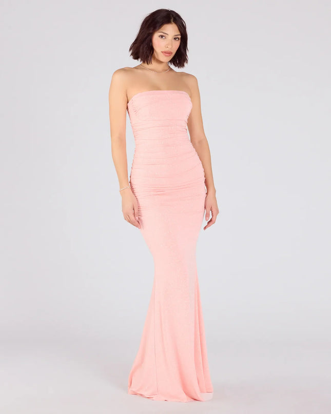 Own the spotlight in the Mischka Strapless Mermaid Glitter Formal Dress, a coral formal dress crafted to deliver luxe style for nighttime weddings, Military Balls, or any special event.