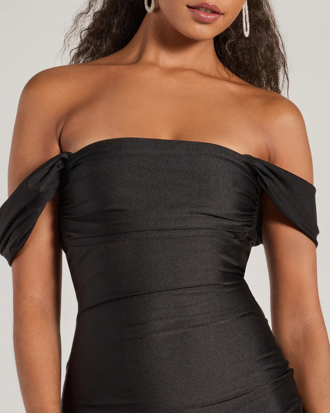 Elevate your look with a midi dress like the Exceptional Off-The-Shoulder Flared Midi Dress in black, featuring a flattering mid-length silhouette and effortless, polished style.