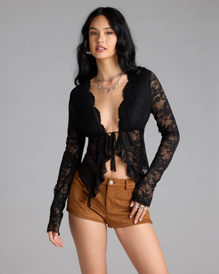 Trendy women’s tops in black, like the Delicate Flair Floral Lace Tie-Front Top, bring effortless style for seasonal layering, lounging, or going out.