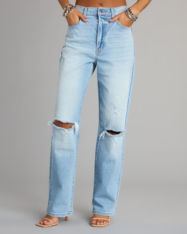 Make a bold statement in the High-Rise Distressed Boyfriend Jeans, a closet must-have among 2026 fashion trends for women.