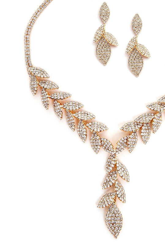 Stay on-trend this season with the Luxe Leaf Lariat And Duster Earrings, a must-have for creating stylish and effortless spring looks.