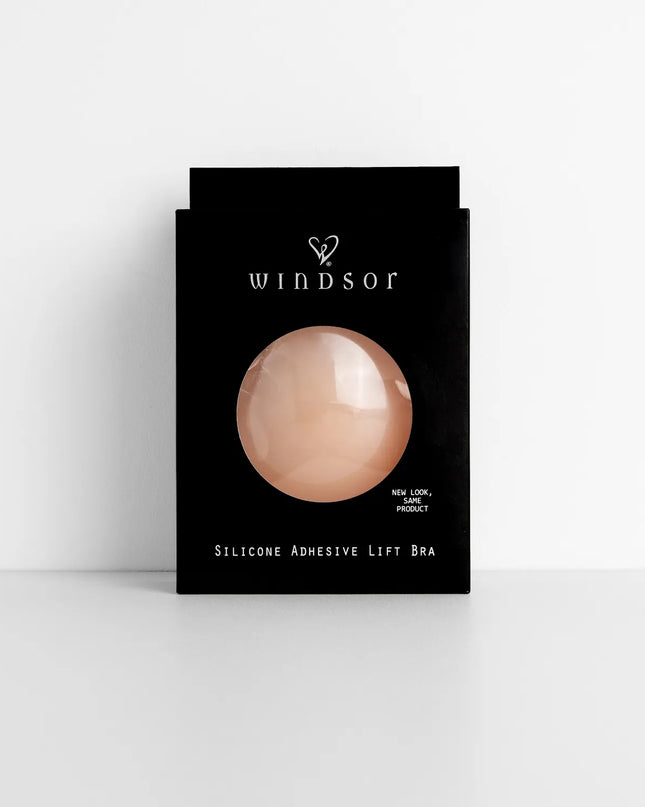 The Silicone Adhesive Lifting Bra in natural brings sleek style to any graduation outfit, from cap and gown to after-party.