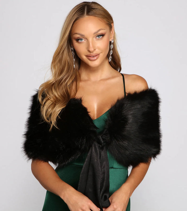 Refresh your wardrobe with the All Class Faux Fur Shawl, a black fashion jacket that adds statement style to every look.